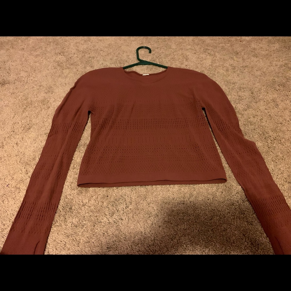 Fabletics long sleeve activewear tee, breathable, dark pink, and size medium.
